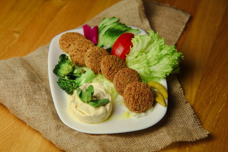falafel meal image with hummus pickles