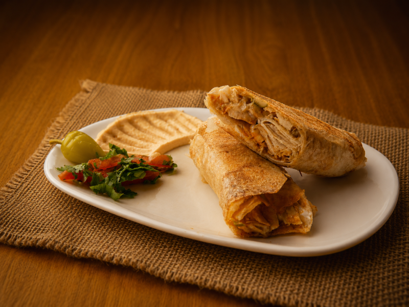 Chicken Shawarma Wrap in fresh Saj bread with garlic sauce and pickles - Kip Shoarma Wrap - شاورما دجاج - Op Saj Kareem Amsterdam